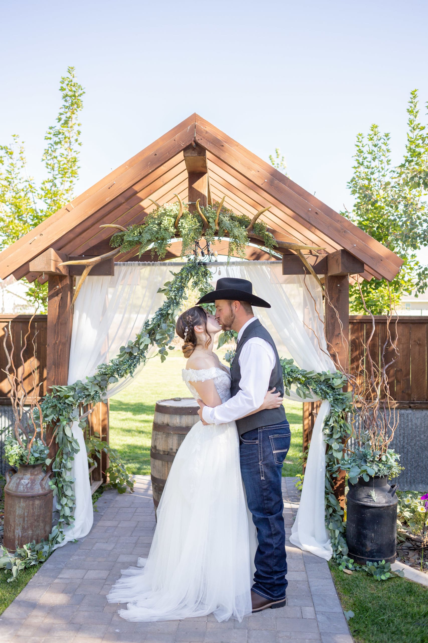 kissing bride and groom