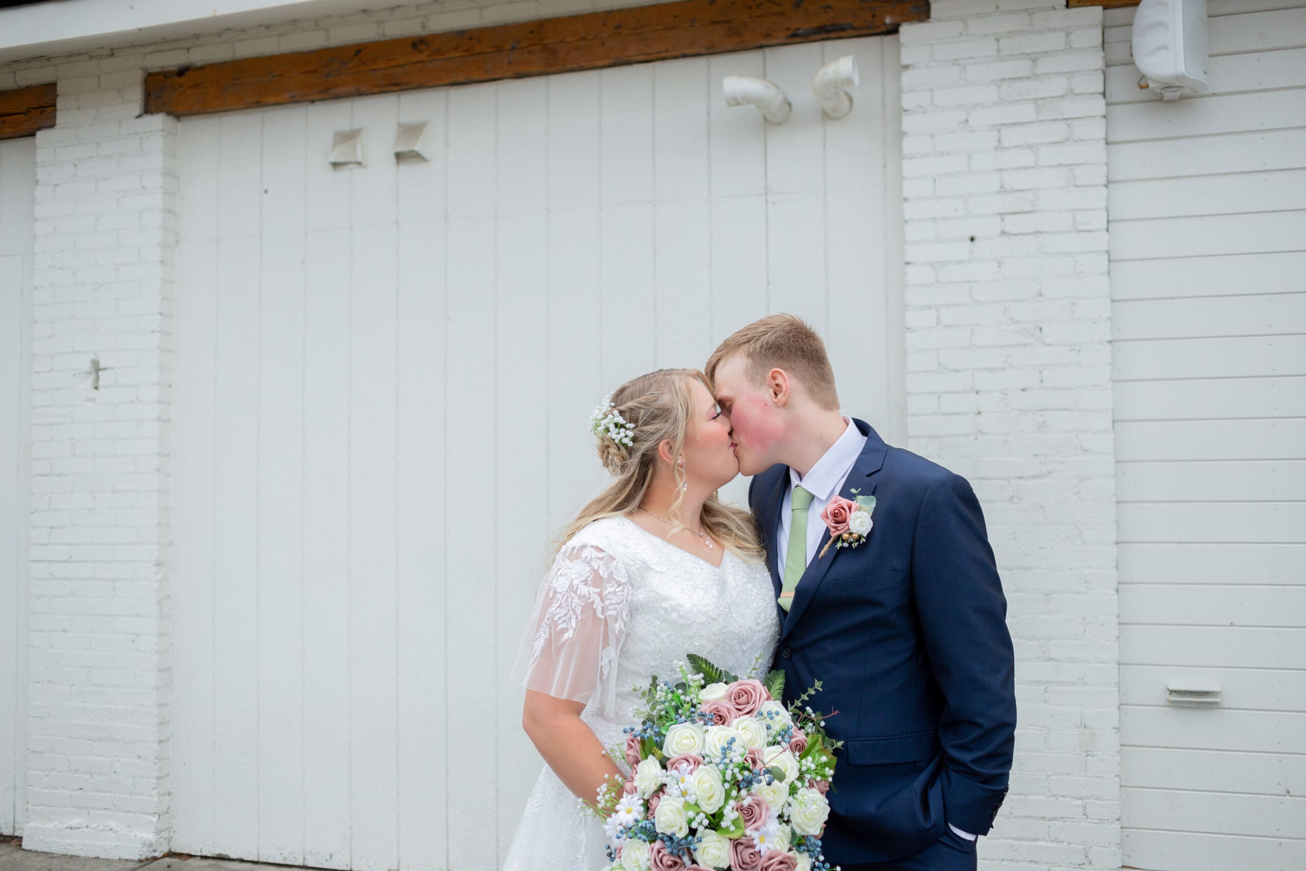 bride and groom kissing