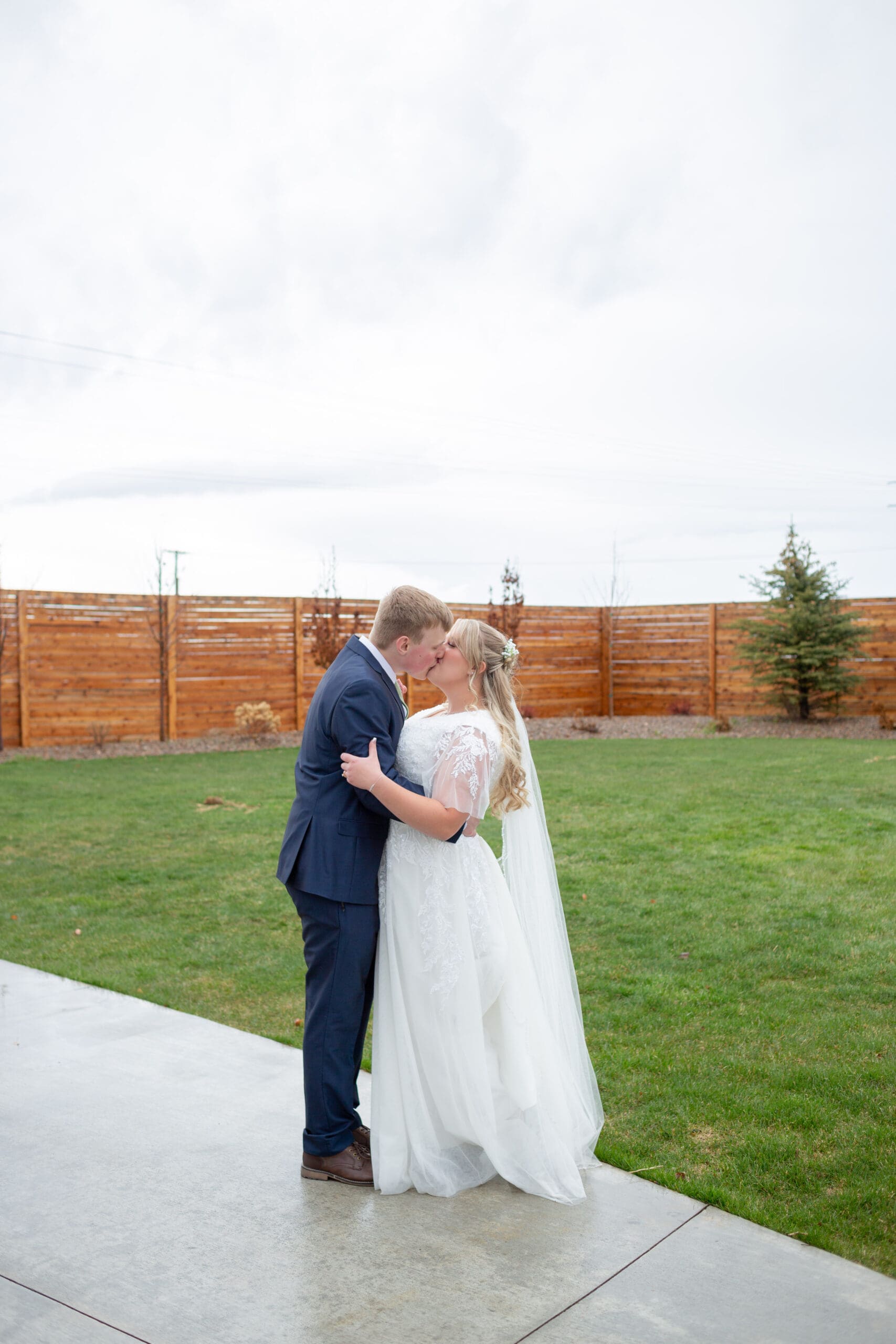 bride and groom kissing