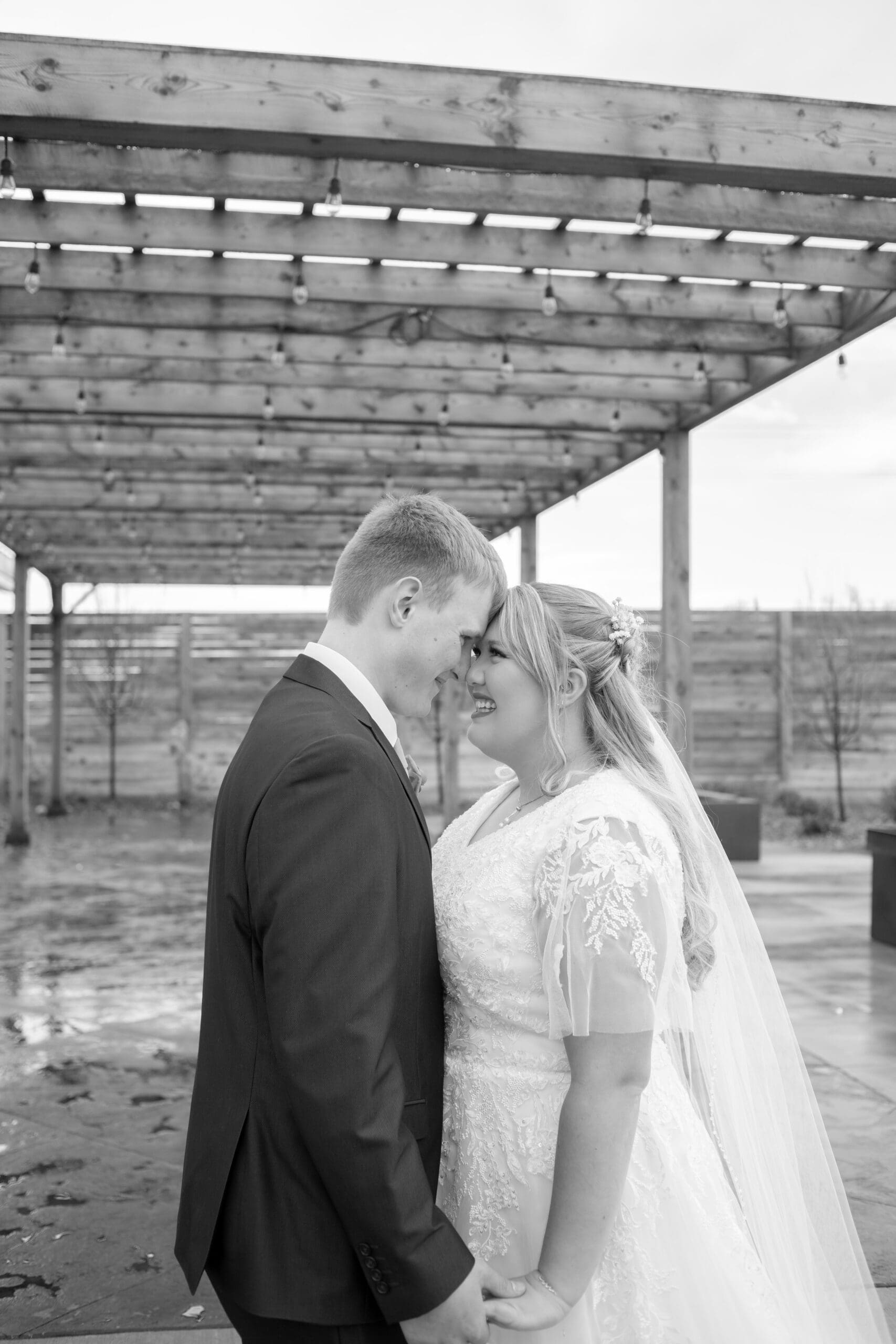 bride and groom foreheads together