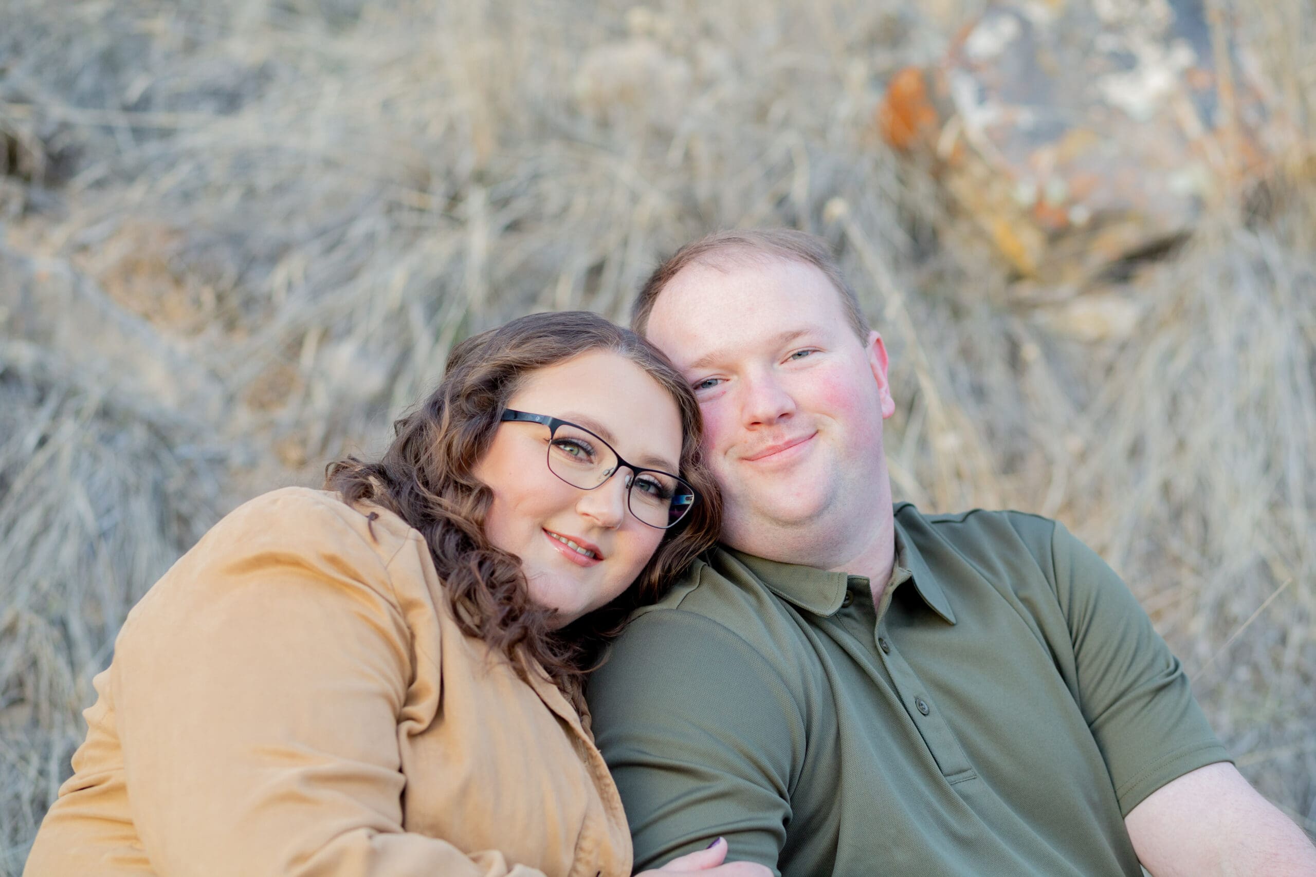 engaged-couple-looking-at-the-camera