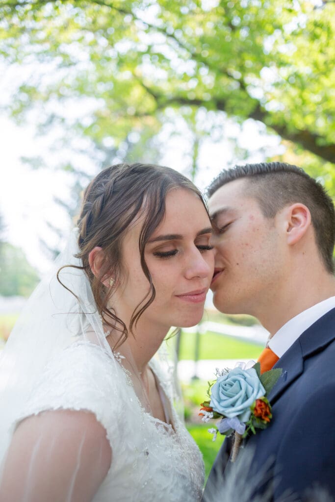 groom-whispering-in-brides-ear