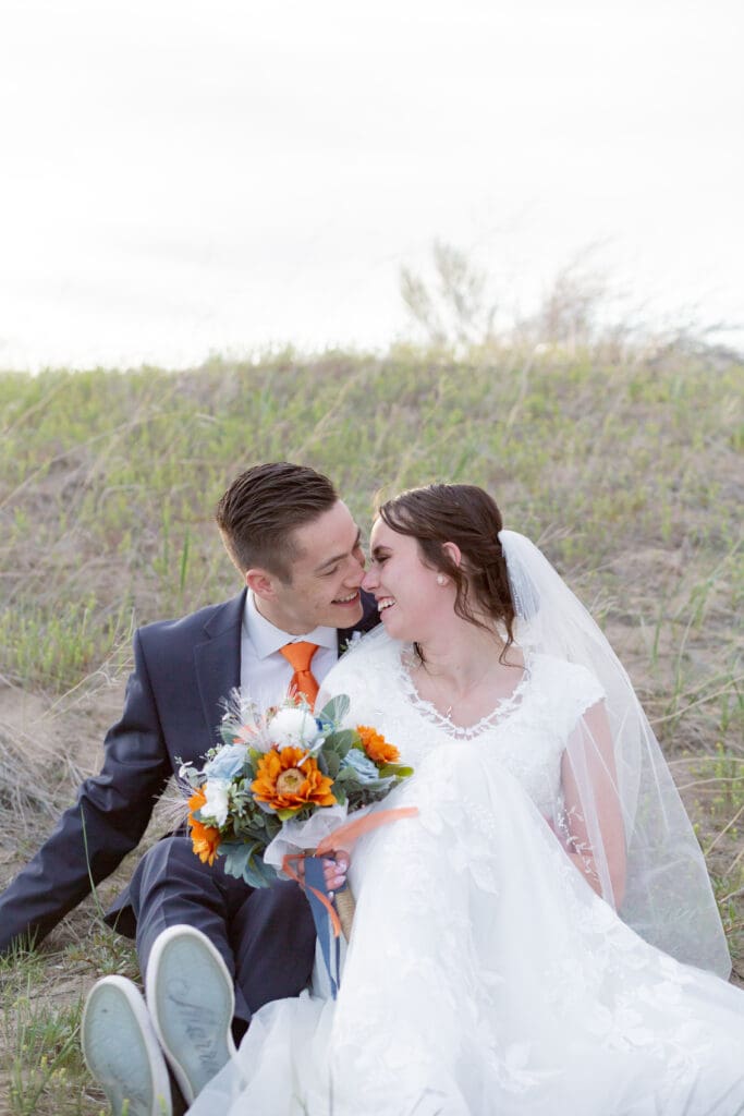 bride-and-groom-sitting-together-looking-at-each-other