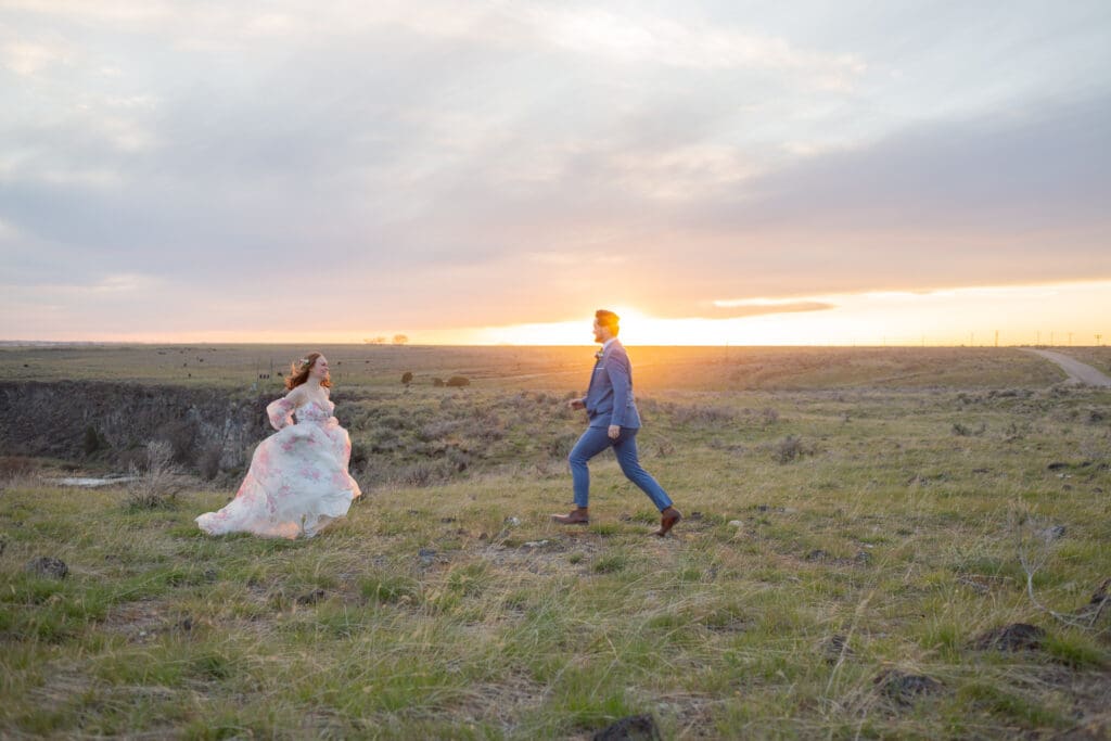 PNW Elopement Photographer captures bride and groom running to one another after PNW elopement