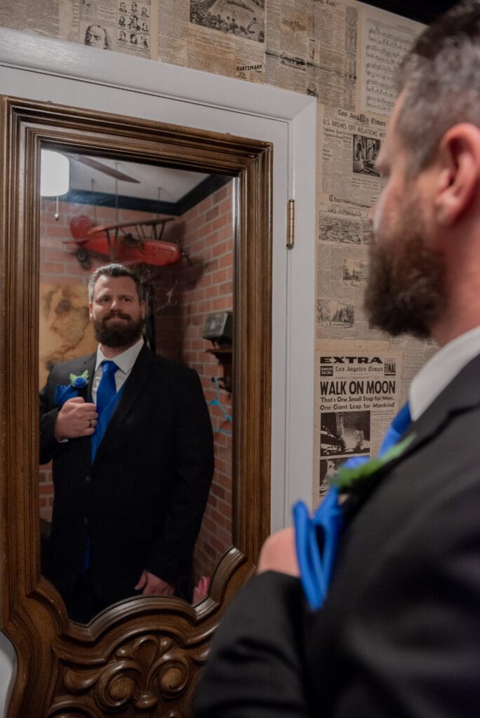 groom-looking-in-mirror