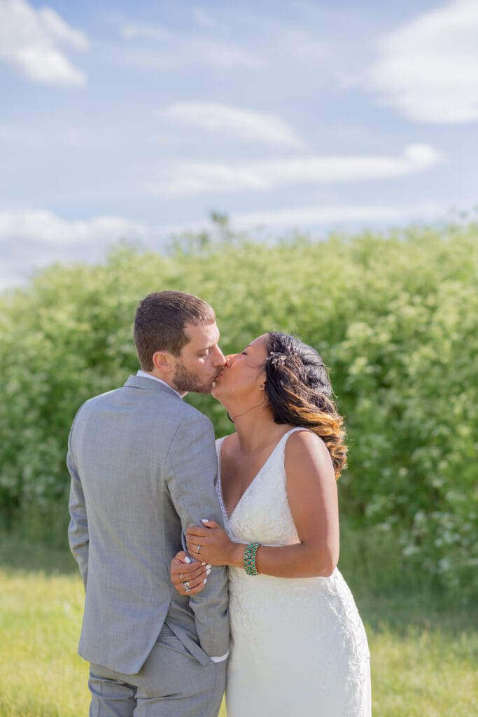 PNW Elopement Photographer captures bride and groom kissing during bridal portraits