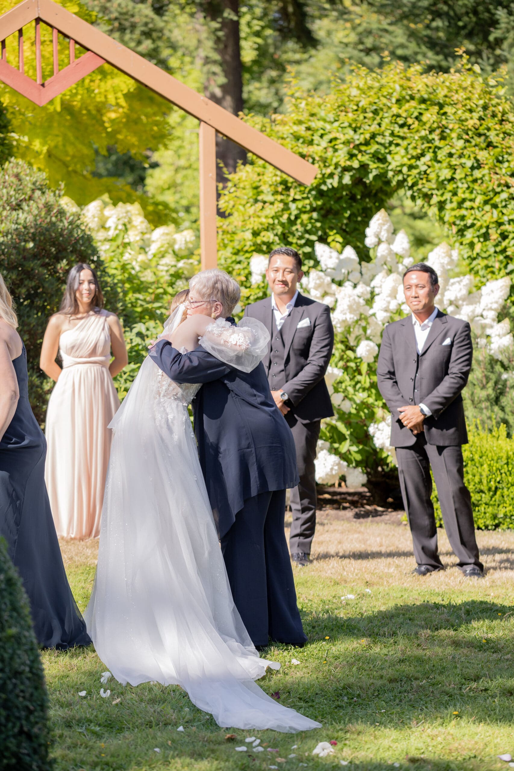 bride-hugging-grandma-before-wedding-ceremony