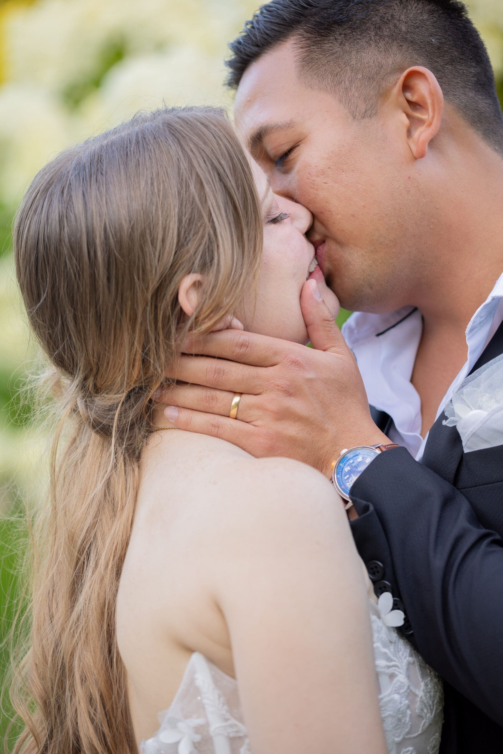 bride-and-groom-kissing-after-their-wedding-ceremony