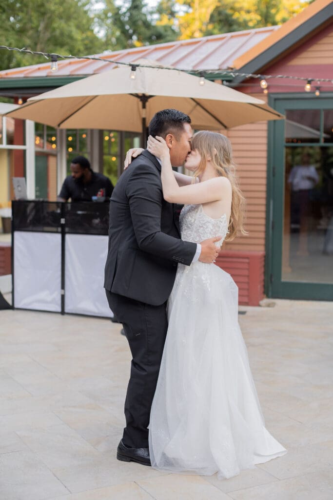 bride-and-groom-kiss-after-first-dance